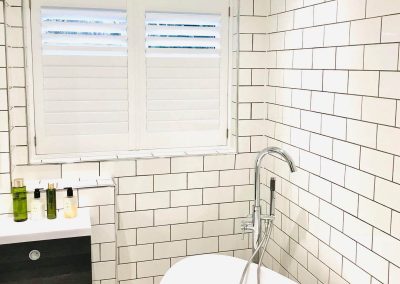 Waterproof bathroom shutters supplied and fitted in Newcastle upon Tyne and across the North East by Signature Window Shutters.