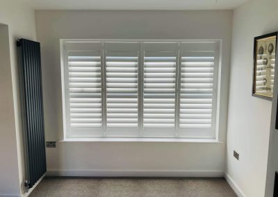 Full height interior window shutters. Supplied and fitted in Newcastle upon Tyne and across the North East by Signature Window Shutters.