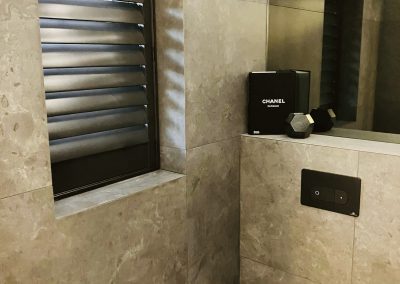 Black window shutters supplied and fitted in Newcastle upon Tyne and across the North East by Signature Window Shutters. Black waterproof shutters for bathrooms