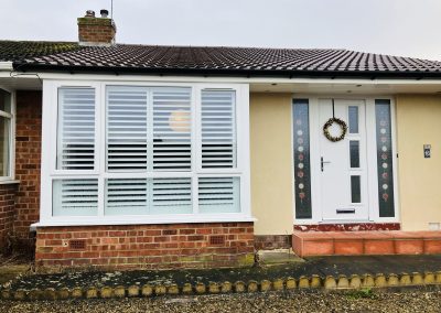 Plantation shutters for bay windows supplied and fitted in Newcastle upon Tyne and across the North East by Signature Window Shutters. Wooden shutter blinds.
