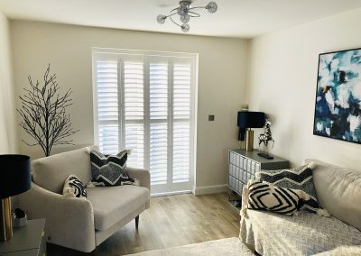 Plantation shutters for doorways supplied and fitted in Newcastle upon Tyne and across the North East by Signature Window Shutters. Bi-fold shutters on a sliding track