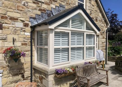 Shaped, triangular Window shutters supplied and fitted in Newcastle upon Tyne and across the North East by Signature Window Shutters