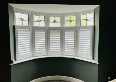 Cafe style bay window shutters