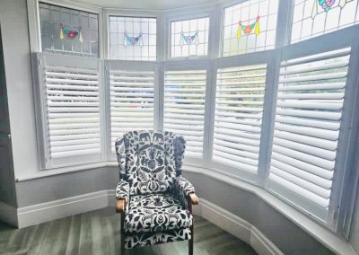 Cafe style shutters, window shutters for bay windows, white shutter blinds
