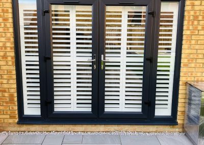 Plantation shutters for doorways. Bi fold shutters for patio doors supplied and fitted by Signature Window Shutters Newcastle upon Tyne