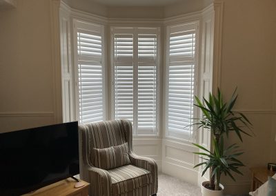 Bay window shutters, supplied and fitted in Newcastle & North East England by Signature Window Shutters. Wooden window shutters for your home.