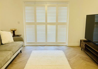 Shutter blinds for patio doors. Sliding track shutters for doorways supplied and fitted by Signature Window Shutters North East
