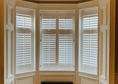 Bay window shutters supplied and fitted by Signature Window Shutters in Newcastle upon Tyne, Gateshead and Northumberland. Made to measure plantation shutters to fit any bay window