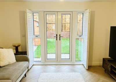 Shutter blinds for patio doors. Sliding track shutters for doorways supplied and fitted by Signature Window Shutters North East