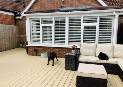 white wooden window shutters on a conservatory in blaydon, tyne and wear. Supplied and fitted by Signature Window Shutters Newcastle