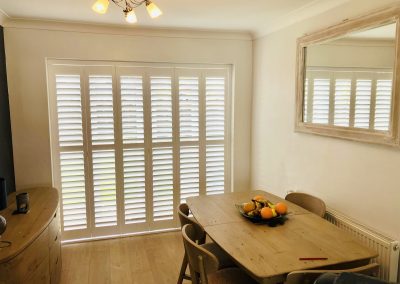 Plantation shutters for doorways. Hardwood bi fold shutters supplied and fitted by Signature Window Shutters in Newcastle upon Tyne, Gateshead & Northumberland