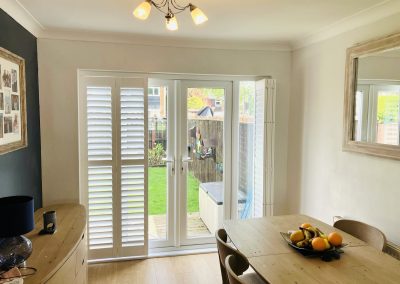 Sliding track doorway shutters for patio doors. Supplied and fitted by Signature Window Shutters in Newcastle upon Tyne.