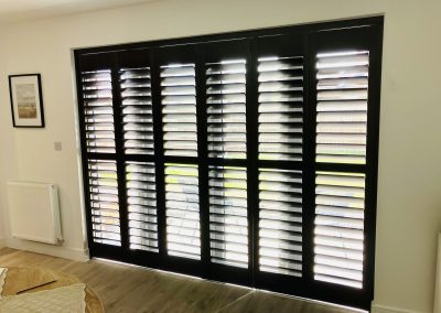 Black plantation shutters for windows and doors. Supplied and fitted by Signature Window Shutters in Newcastle, Gateshead & Northumberland