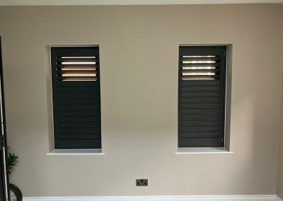 Dark grey window shutters. Supplied and fitted by Signature Window Shutters Newcastle upon Tyne, Gateshead & Northumberland