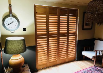 Stained hardwood shutters for windows and doorways - plantation shutters made to measure. Supplied and fitted by Signature Window Shutters in Newcastle, Gateshead & Northumberland