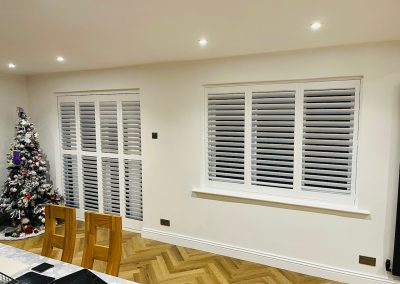 White wooden shutters for windows and doorways - plantation shutters made to measure. Supplied and fitted by Signature Window Shutters in Newcastle, Gateshead & Northumberland