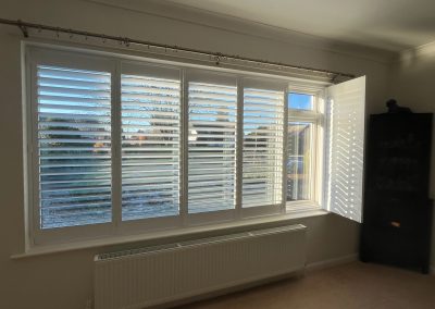 Hardwood window shutters for large wide windows. Installed by local experts Signature Window Shutters in Newcastle, Gateshead & Northumberland